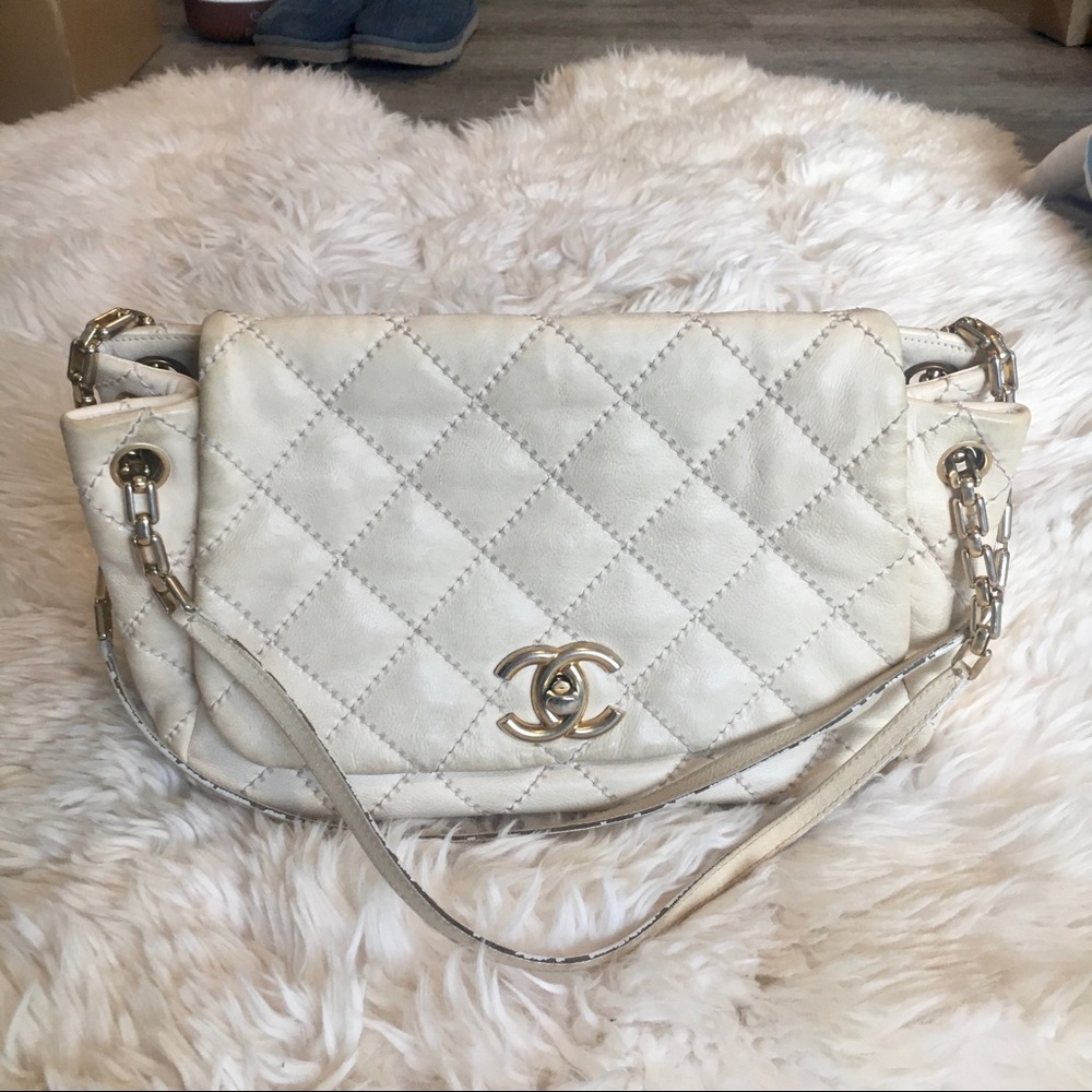 Chanel cream quilted bag GHW worn